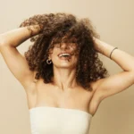 Effective frizz control tips and products for smooth, sleek hair that stays frizz-free throughout the day, even in humid conditions.