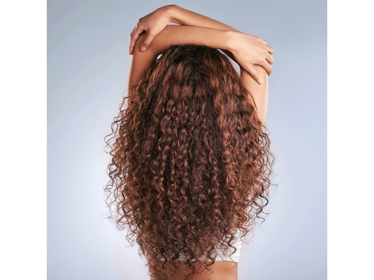 Nourishing hair mask for curly hair that hydrates, defines curls, and controls frizz, leaving hair soft and manageable.